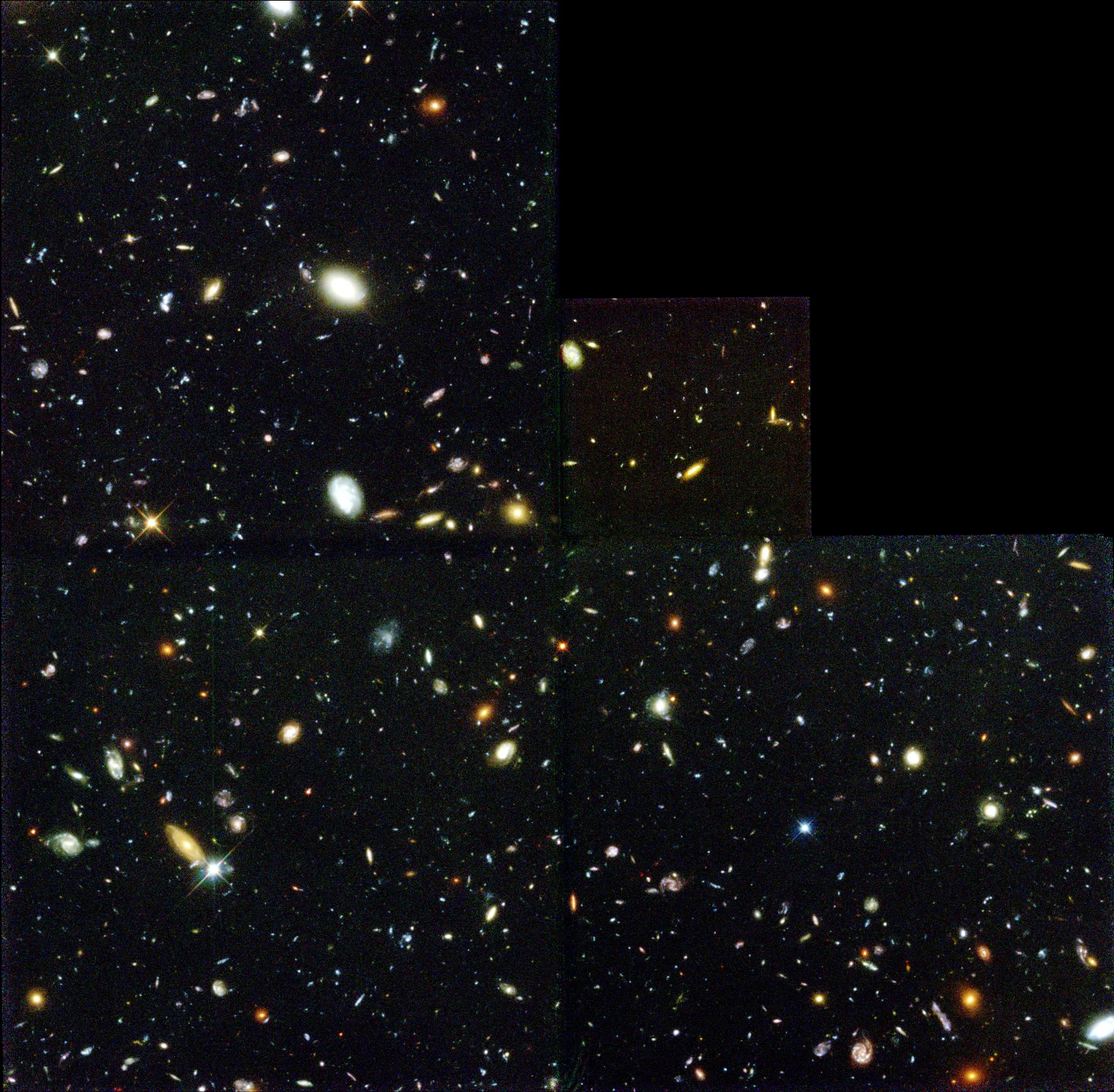 A dark patch of sky crowded with faint galaxies in the Hubble Deep Field